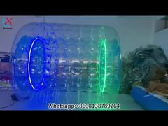 Ver fábrica Luz LED Tubo de rodillo de PVC Juego de pelota con rodillo Cuerpo inflable Bola Zorb Demostración