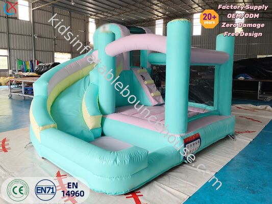 Castillo de salto de PVC pastel de grado comercial con tobogán para niños Fiestas y eventos