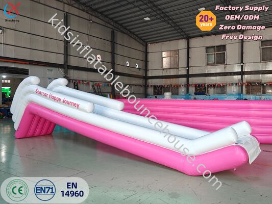 Deslizador de agua inflables rosa para yates Deslizador de agua inflables personalizado para entretenimiento acuático en yates